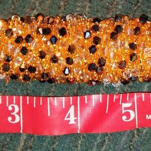 Beaded Bracelet with Orange and Black Crystals
